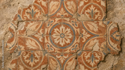 Ornate Floral Patterned Tiles with Earthy Tones and Detailed Design.