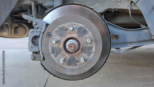 Car brake disc and caliper repair or maintenance