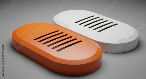 Two modern minimalist oval soap dishes in orange and white colors with bathroom