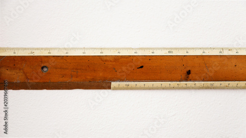 Detail of old wooden ruler. Horizontal background