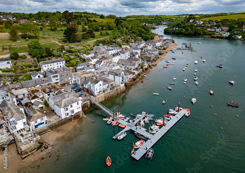 Aerial views of the seafront and estuary at Fowey on the south coast of Cornwall, England.