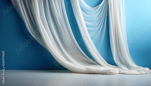 Kain Putih Tergantung Crisp White Fabric Drapes Elegantly On A Light Blue Wall Creating A Clean And Minimalist Visual Display