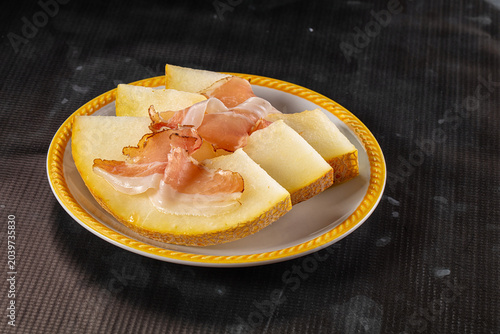Canvas-taulu Slised sweet melon with Jamon
