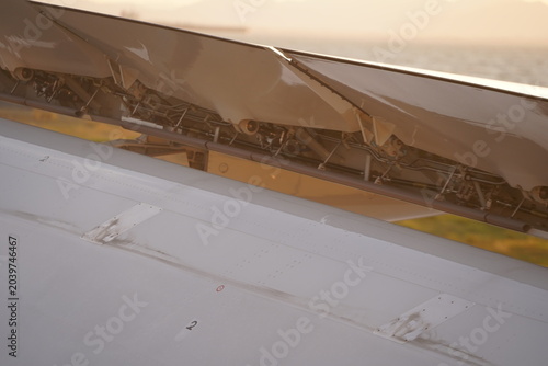 Close Up Airplane Wing Spoilers And Flap Mechanisms