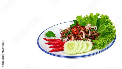 A vibrant culinary presentation featuring a stir-fry, peppers, cucumbers, fresh herbs, and squid, arranged artfully on a white plate