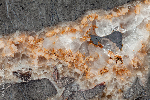 Cristal white golden vein of a dark gray marble close up background texture material