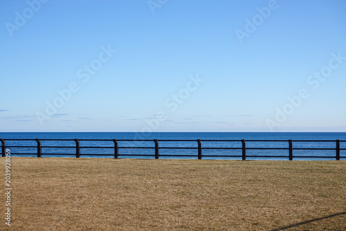 Photography Seaside Barrier With Calm Horizon