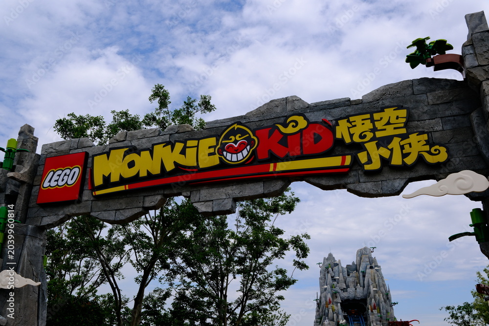 Naklejka premium Shanghai,China-May 30th 2026: Entrance sign for the Lego Monkie Kid themed area at Legoland Shanghai.