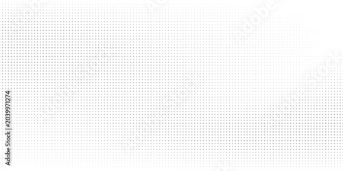 Fotografie Abstract halftone background with wavy surface made of gray dots on white vector