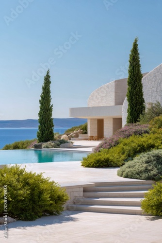 modern terrace and pool area with a building and vast ocean views