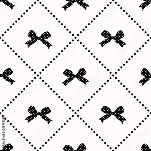 Seamless pattern with black ribbon bows and dots on a white background. Vector illustration.
