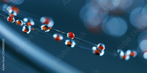 An artistic representation of water molecules featuring distinct droplets, emphasizing beauty in science, nature, and the molecular structure of water in a blue-toned background.