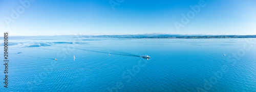 Aerial panoramic view of the scenic Lake Constance shore and vineyards in Hagnau, Germany.