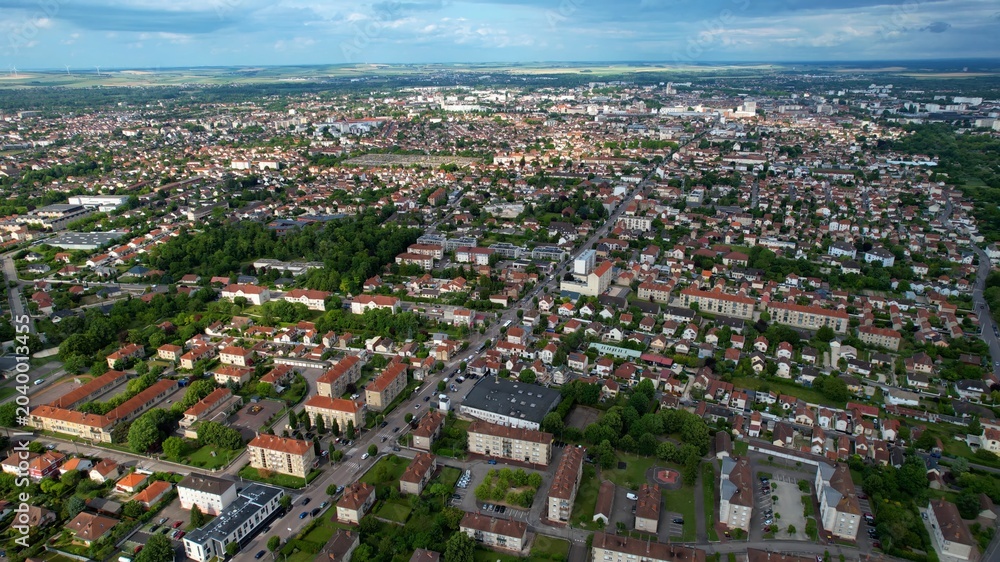 Obraz premium Panoramic aerial view around the old town of the city La Rivière-de-Corps in France on a sunny spring afternoon
