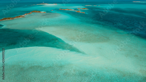 Konstfotografi Aerial view of shallow underwater sand flats and turquoise water channels in Exuma Bahamas, tropical marine landscape with sandbars