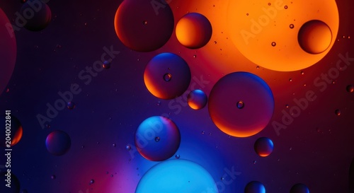 Colorful translucent shiny bubbles floating in mid air with gradient background
