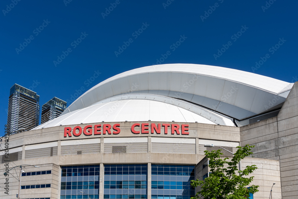 Naklejka premium Toronto, Canada - May 30, 2026: Exterior of the Rogers Centre, a multi-purpose retractable roof stadium in downtown Toronto, Canada.