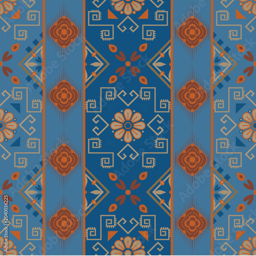 Ethnic Ikat Geometric Seamless Pattern with Traditional Blue and Orange Floral Motifs