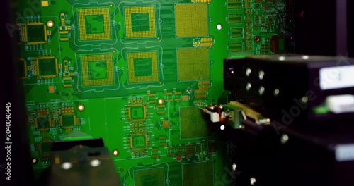 Extreme close-up of a high-tech robotic testing arm conducting quality control on a printed circuit board (PCB). Automated electronics manufacturing, artificial intelligence in industry