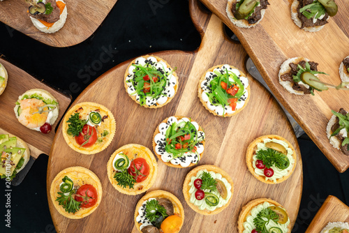 High angle view of gourmet catering appetizers and tartlets