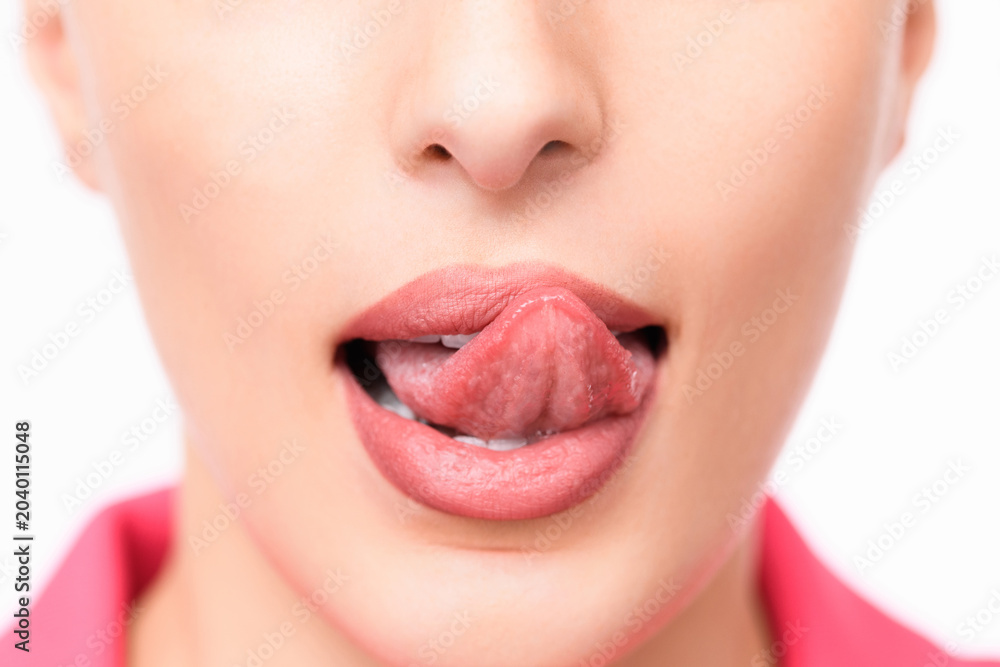 Naklejka premium Tongue sticking out from mouth