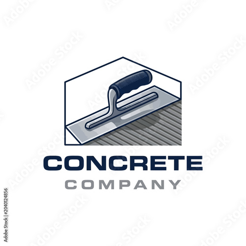 A construction worker uses a trowel on concrete at a building site outdoors.