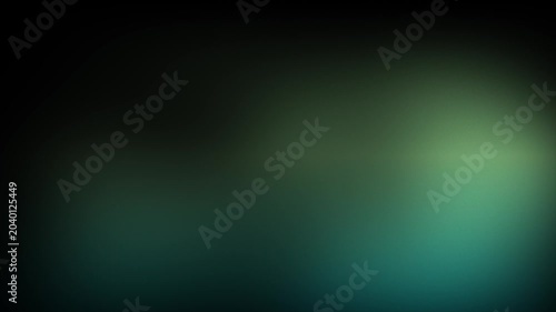 Animation abstract soft gradient light leaks loop motion background on black background. Blurry green and black gradient background.
