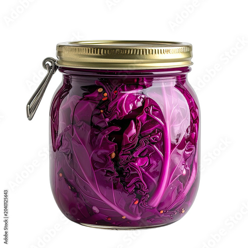 A jar of vibrant red cabbage is preserved with spices.