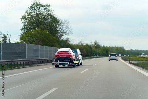 Tableau sur toile Tow truck responding to an unexpected road breakdown
