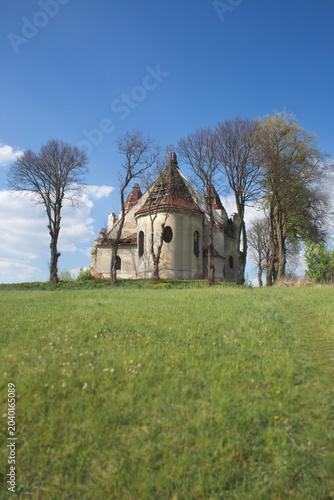 Фотография Ruins of Mary Magdalene Roman Catholic Church in Vovkiv village standing on a gr