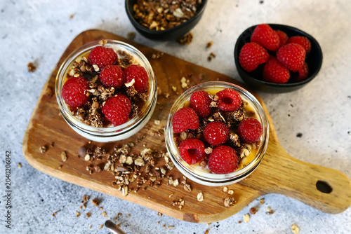 healthy dessert with yogurt and raspberries