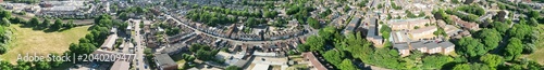Aerial Ultra Wide Panoramic View of Residential District of Luton City During Clear Blue Sky. Drone Flight Above Urban City Streets of British City and Town of England Great Britain. 