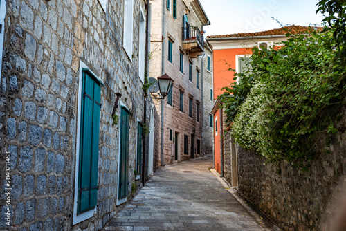 Charming narrow stone streets and steps winding through the historic old town of Herceg Novi, Montenegro