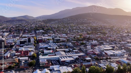 CDB of Hobart city in aerial panorama from Mt Wellington to Derwent river cove waterfront.