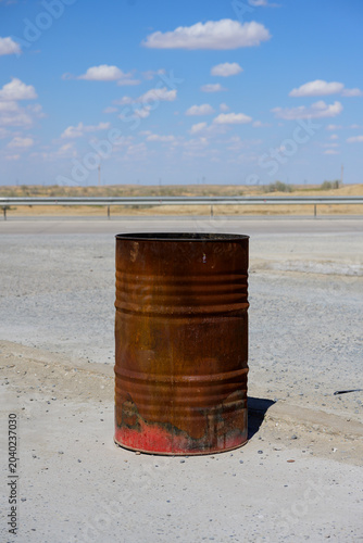 Rusty Old Oil Barrel or Drum at a Petrol Station on the A380 Highway in Uzbekistan
