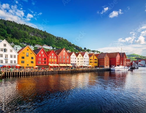 historic bryggen hanseatic wharf in bergen norway unesco site showcasing vibrant colored wooden houses along picturesque waterfront landscape