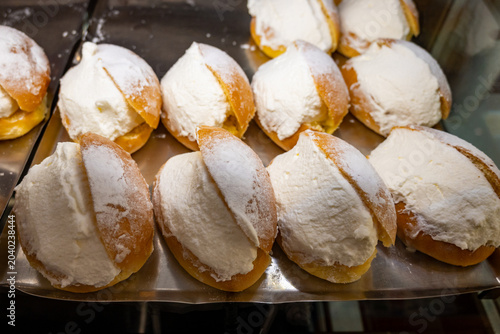 Konstfotografi Maritozzo sweet bun brioche with whipped cream, iconic pastry from Rome, Italy