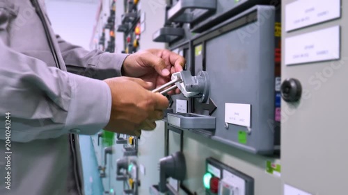 Electrical lockout system applied before maintenance work highlights safe work procedures, engineering safety management, and protection of personnel in industrial facilities.