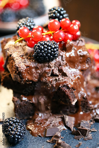 brownies with chocolate and berries