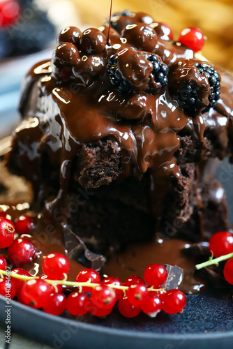 brownies with chocolate and berries