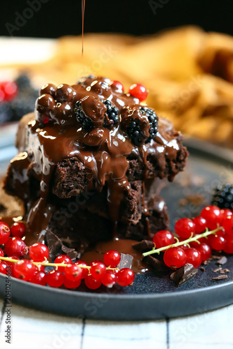 brownies with chocolate and berries