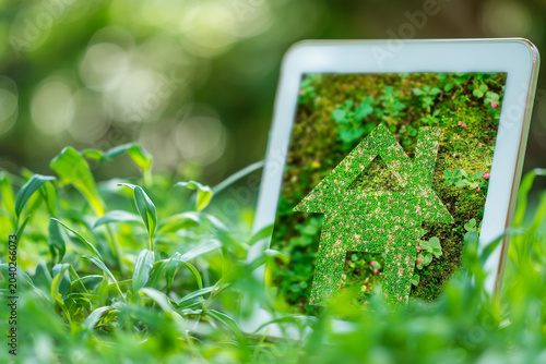 A tablet with a house on it