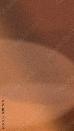 Foto A textured terracotta-to-orange gradient softly blends with a blurred edge, offering a warm, grounded backdrop for hospitality, packaging, and editorial layouts