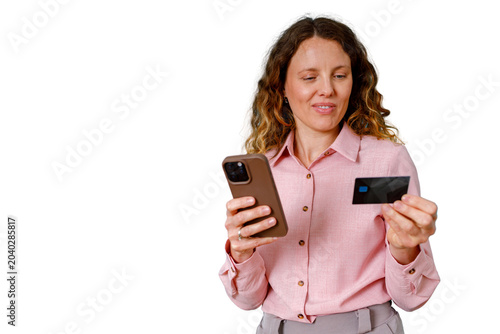 Bilde på lerret Woman holding a smartphone and credit card, making a secure digital payment