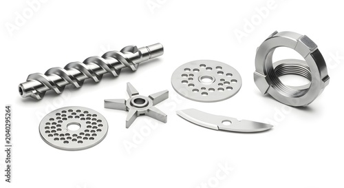Essential shiny metallic parts of a disassembled meat grinder, featuring the auger, sharp blade, and perforated grinding plates for efficient food preparation