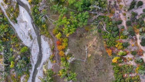 Aerial views of fall landscapes in Colorado with vibrant colors in nature and winding rivers near Dallas Divide in San Juan Mountains range wilderness - 4K Drone