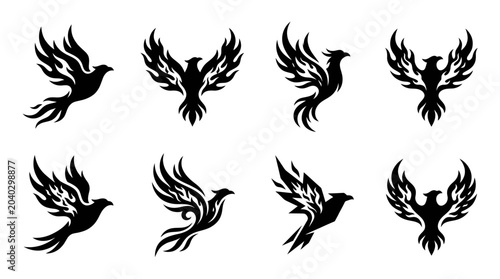 Fotografija Set of stylized phoenix bird silhouettes, abstract fire wings, mythical creature