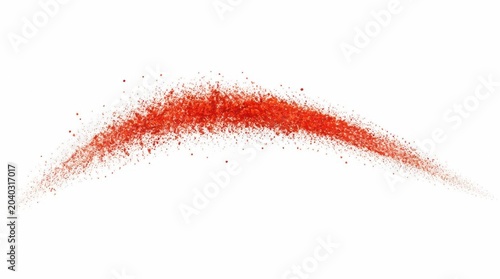 Red powder splash in curved arc shape isolated on white background.