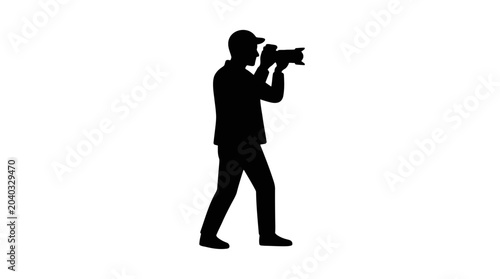 Canvastavla Photographer silhouette captures a moment while holding a professional camera to his eye