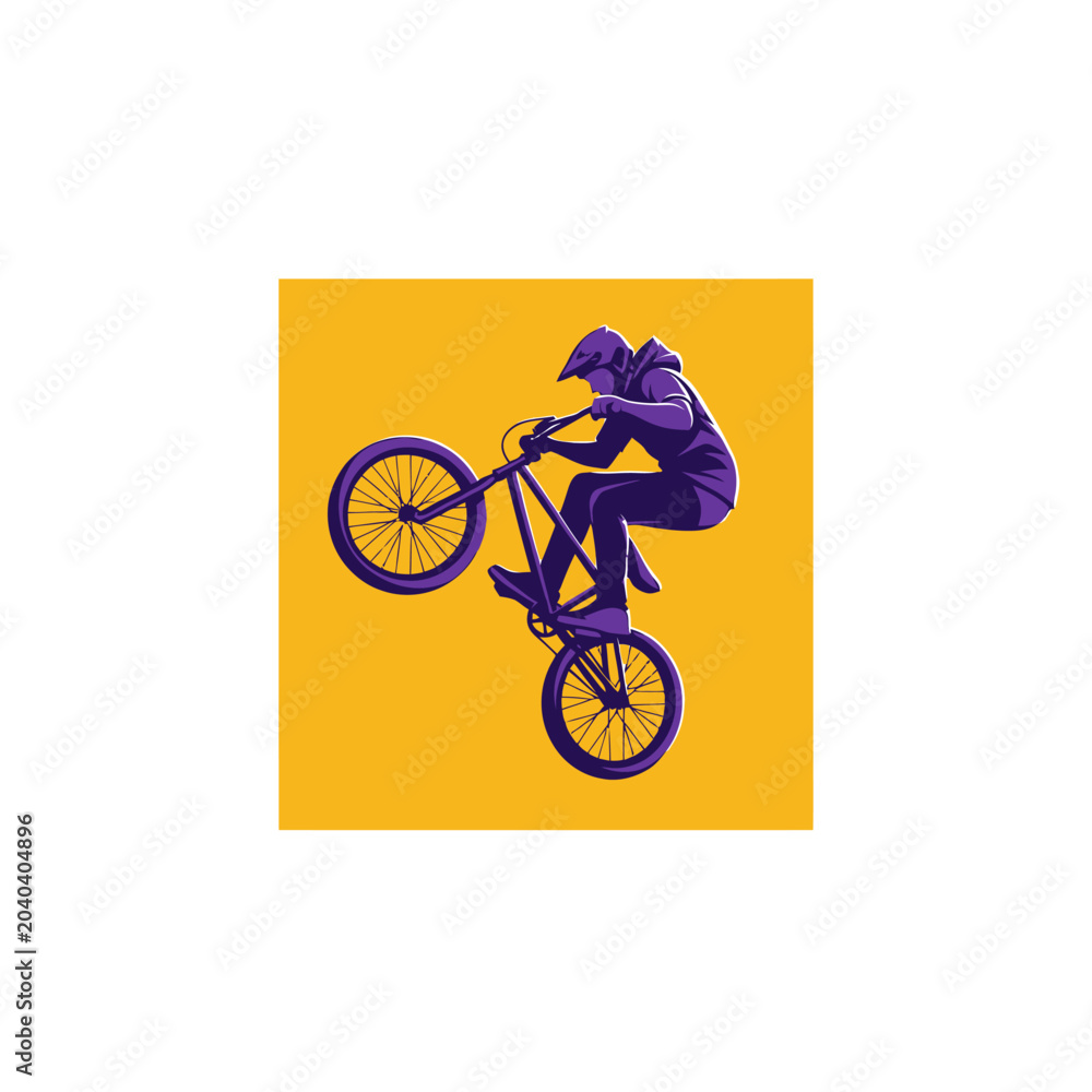 Fototapeta premium Cyclist performing a wheelie trick against a vibrant yellow background